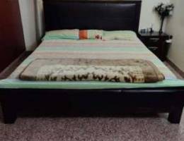 Cot with mattress and side tables