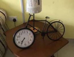 Table lamp with standing clock