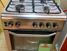 Stove with closed door grilling system