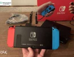 نينتندو سويتش مع وحدة تحكم Joy-Con باللون ...