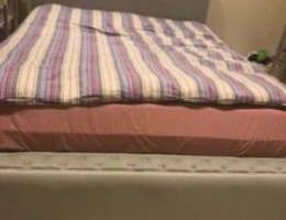 Bed with mattress