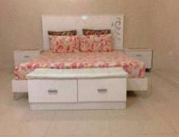 bed with side table