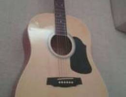 Excellent acoustic guitar barely used