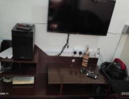 Tv and speaker and tv stand