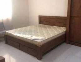 fully furnished room with attached bathroo...