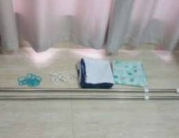 Shower curtains with rods and hooks