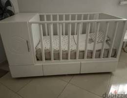 baby crib with cabinets