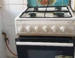 One Gas Cylinder and 4 burner oven urgently  for sale