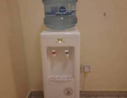 coolex water dispenser with 5 albayan bottles