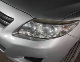 Corolla car 2009 Head lamp used but like new