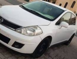 Nissan tida model 2011 good condition oman car