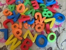 alphabets , numbers and plastic balls